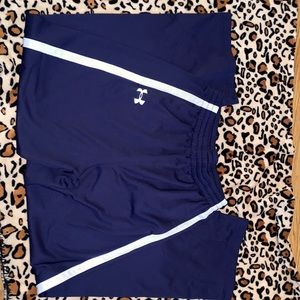 Boys Navy blue and white youth under armor pants